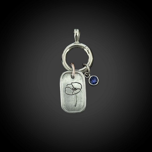 Sterling-silver September Morning Glory birth-flower charm with 4 mm Sapphire CZ and hinged charm holder.