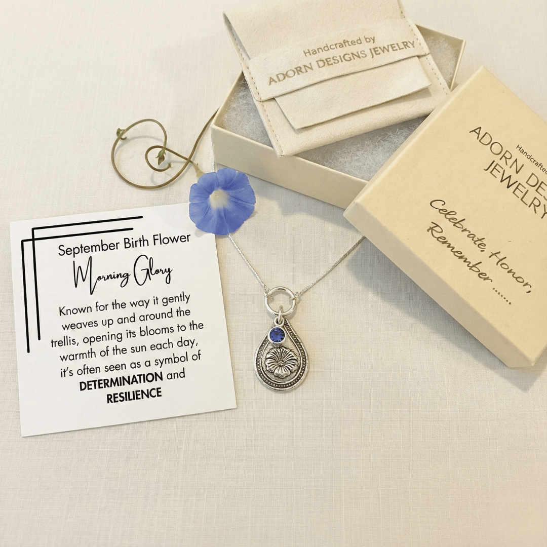 September morning glory birth flower sterling silver necklace with sapphire-blue CZ stone, Adorn Designs gift box, pouch, and September morning glory meaning card.