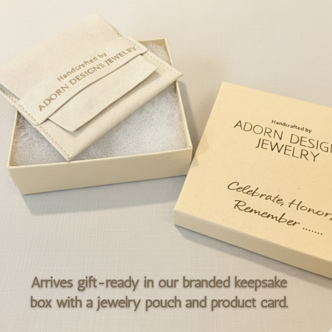 Adorn Designs Jewelry packaging with a jewelry pouch and product card on a light background.