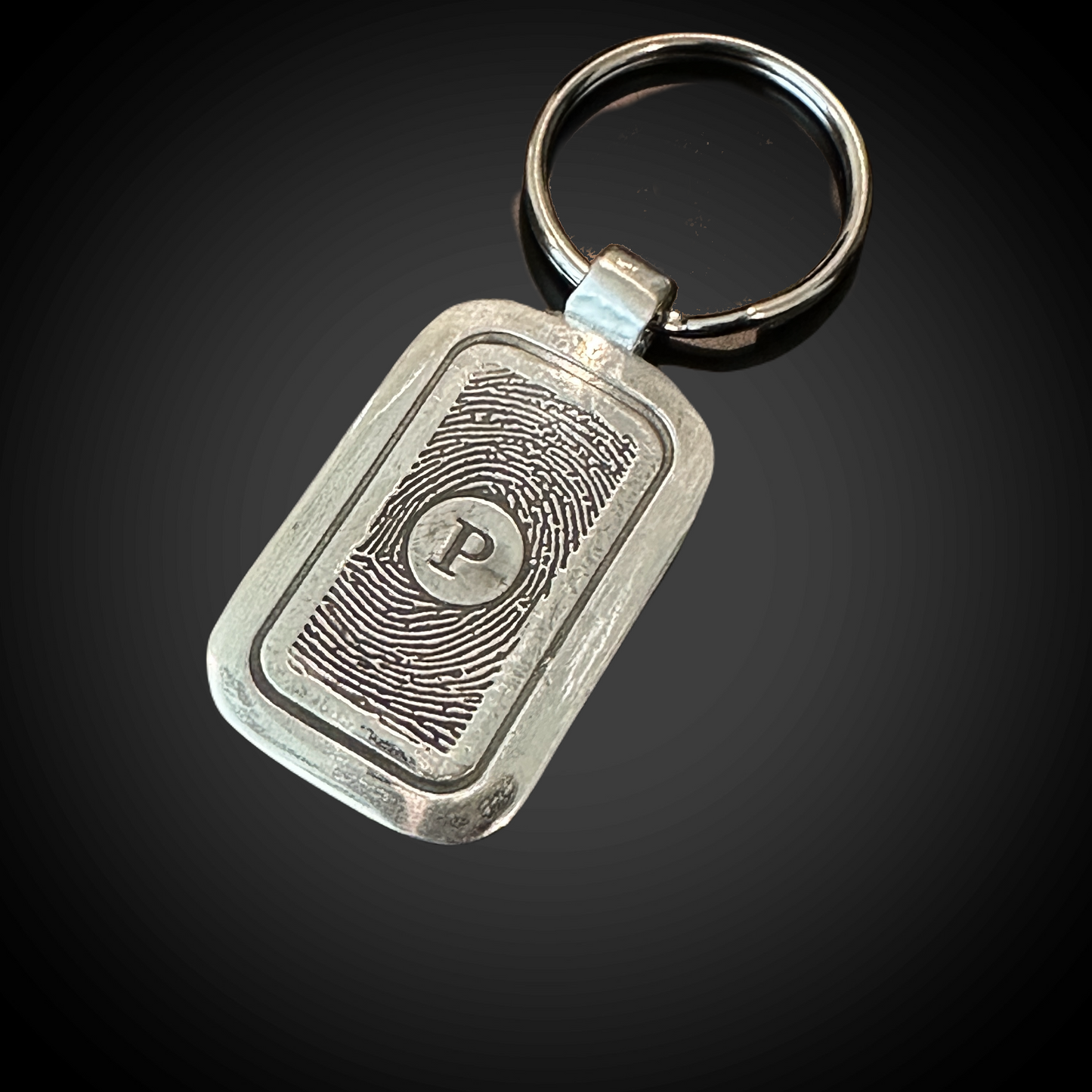 sterling silver rectangle keychain with single initial and fingerprint impression