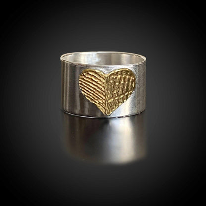 Wide-band sterling-silver fingerprint heart ring with 24K gold-plated fingerprint detail.